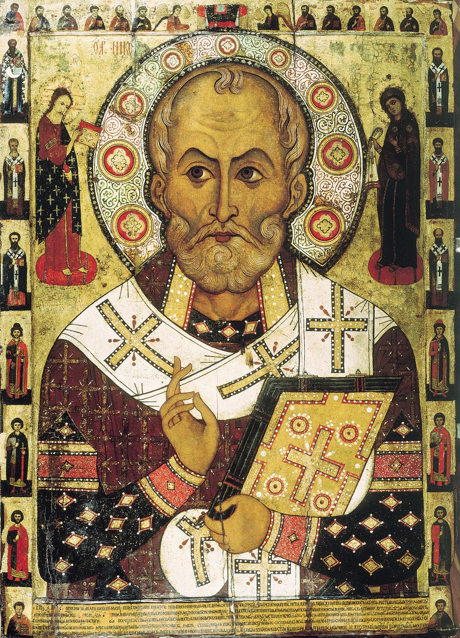 Średniowieczna ikona: św. Mikołaj jako siwy biskup z księgą Ewangelii w dłoni, w szacie z krzyżami, na złotym tle.